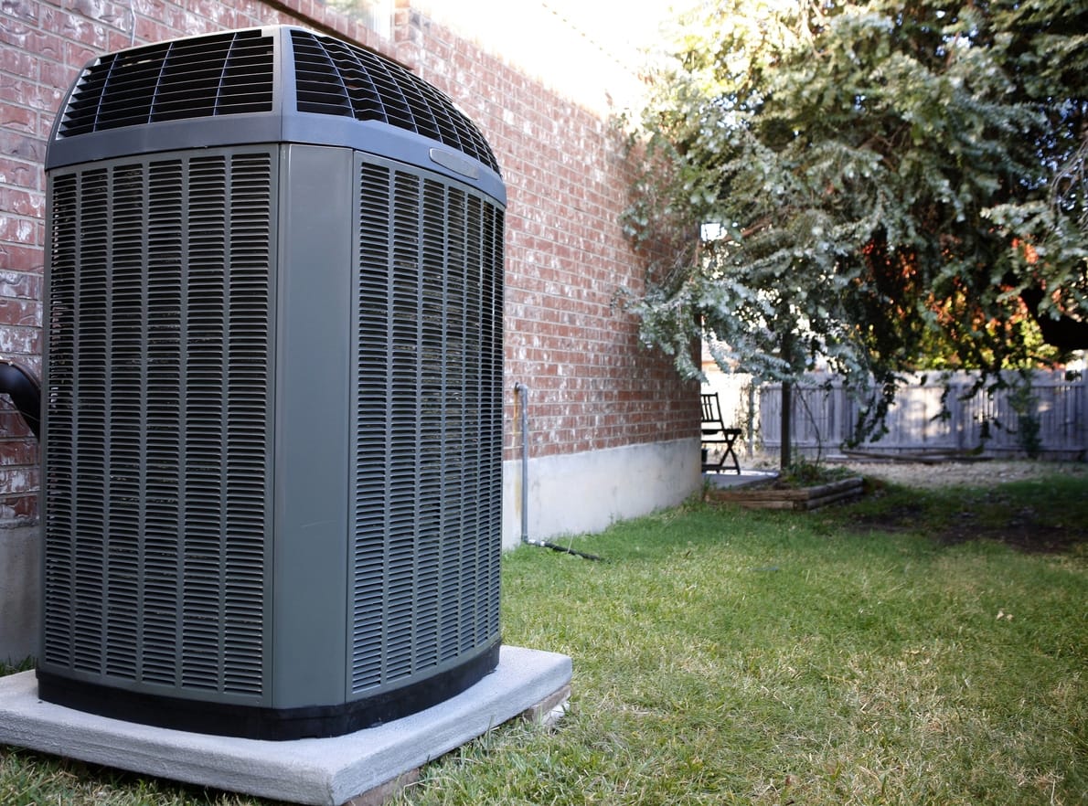 AC condenser unit - operational, clean coils, proper clearance