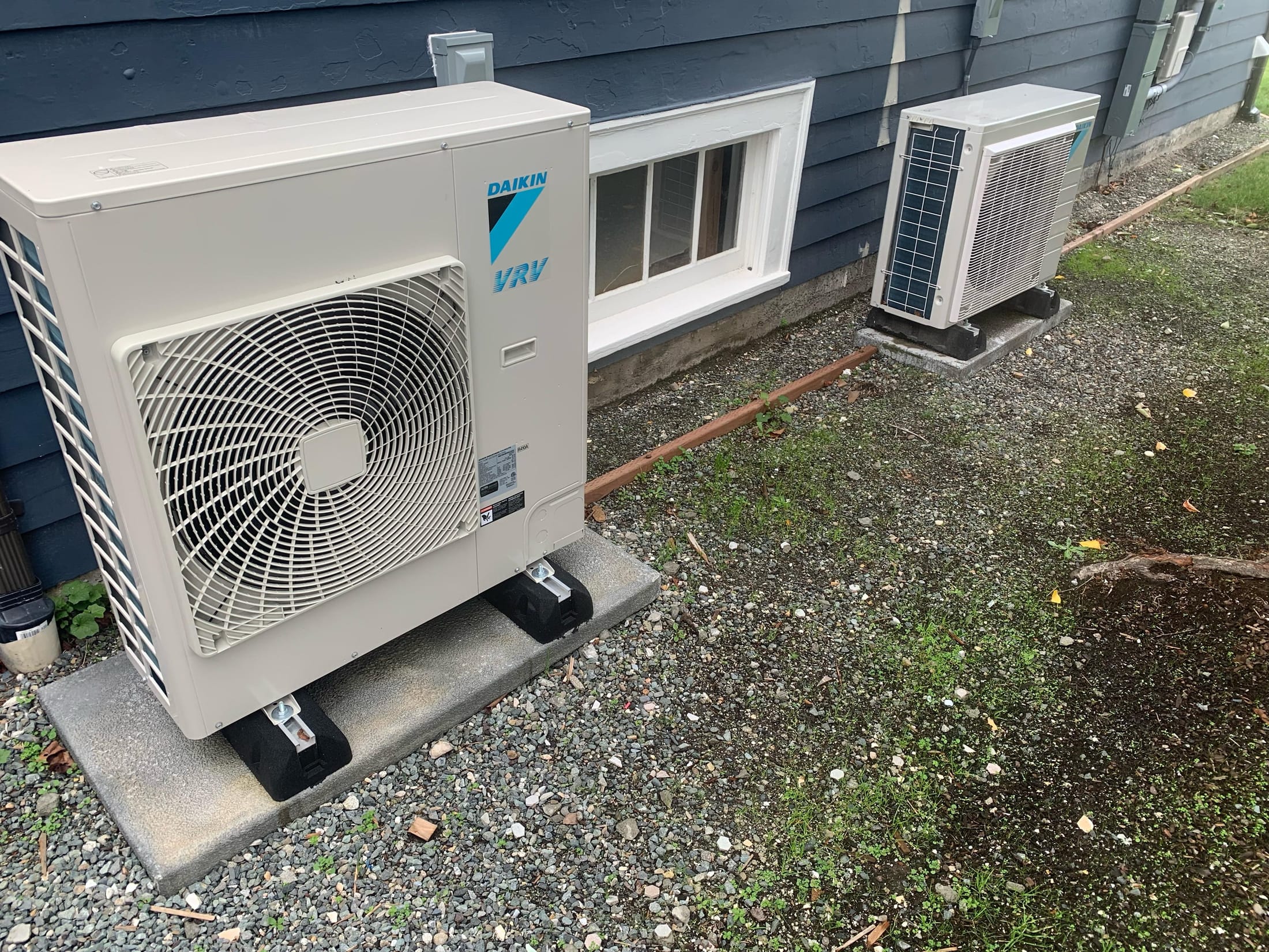Full condenser installation - outdoor placement and clearance verified